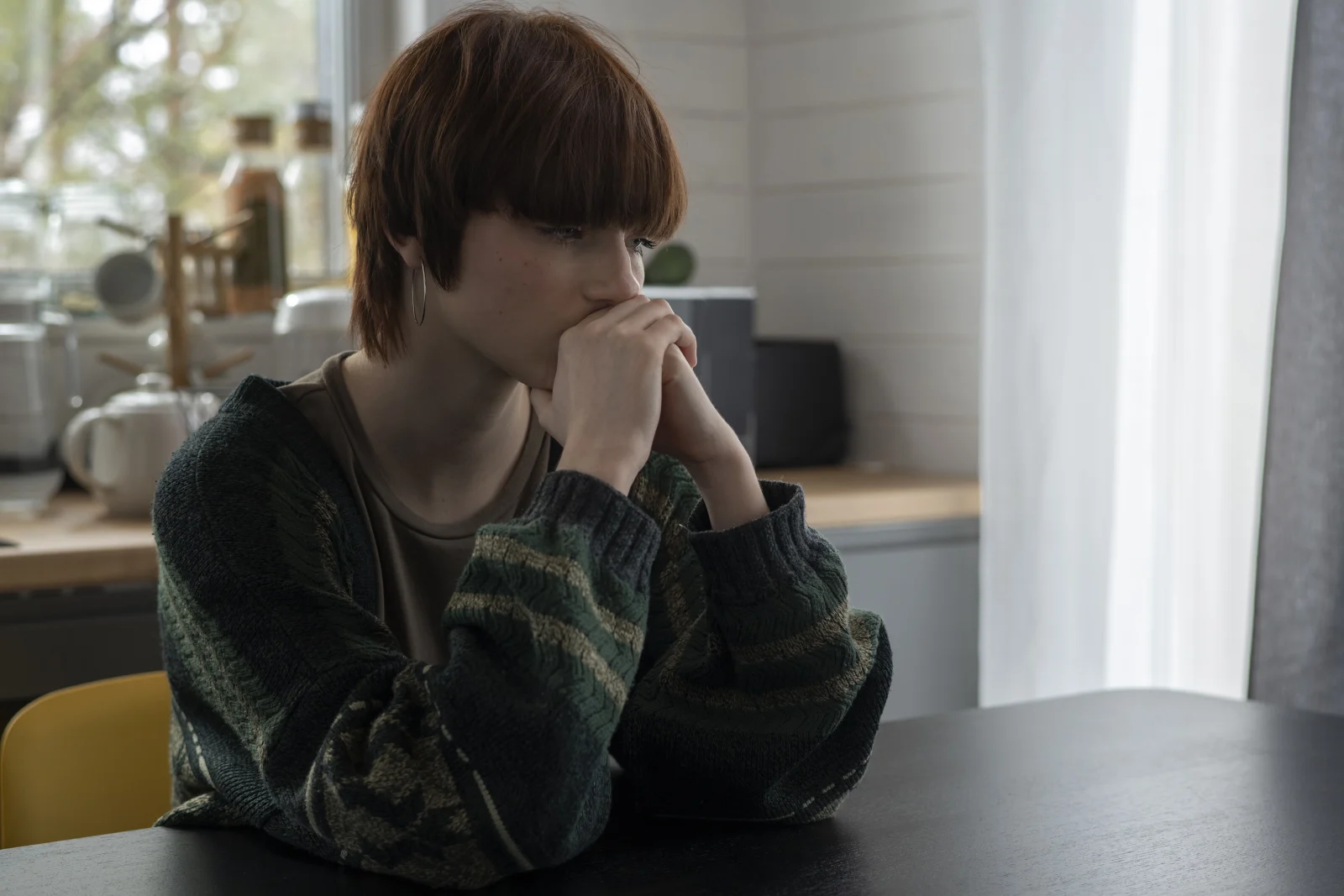 Teenager holding his hands to his face – online psychiatry in Beaverton, OR